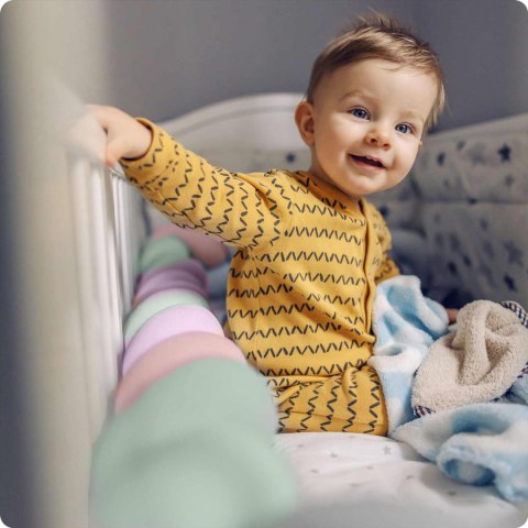 Otulacz do łóżeczka Ricokids – pleciony ochraniacz warkocz 3m miętowo-różowo-fioletowy
