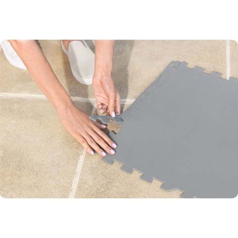 Mata Ochronna Pod Basen Jacuzzi Puzzle Bestway 60334 16 Szt. 50 x 50 cm Mata Ochronna Pod Basen Jacuzzi Puzzle Bestway 60334 16 Szt. 50 x 50 cm