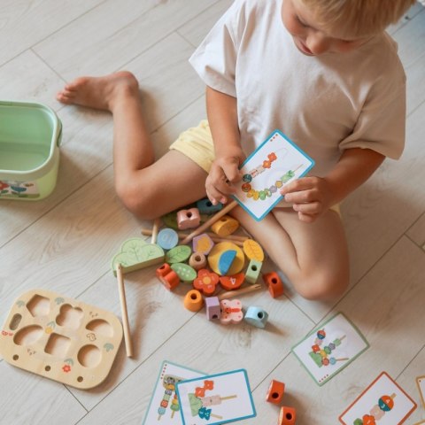 Drewniany sorter edukacyjny 7w1 Tooky Toy box ogród układanka